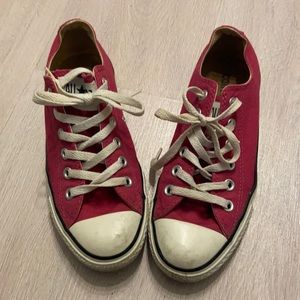 Pink Converse low cut All-stars